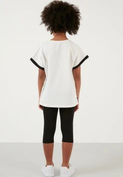LELA REGULAR FIT - Leggings - Off White/black , Niños -LELA Tienda b86fa763cd2f4e7da21530b7d835586c