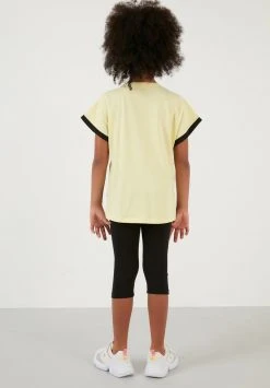 LELA REGULAR FIT - Leggings - Yellow/black, Niños -LELA Tienda bb2c387c973f41b6a2576bd27567496d