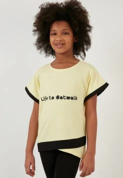 LELA REGULAR FIT - Leggings - Yellow/black, Niños -LELA Tienda e14eb4c8127c428bacddb18c88f2165c