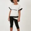 LELA REGULAR FIT - Leggings - Off White/black , Niños
