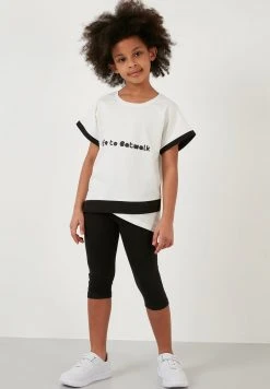 LELA REGULAR FIT - Leggings - Off White/black , Niños